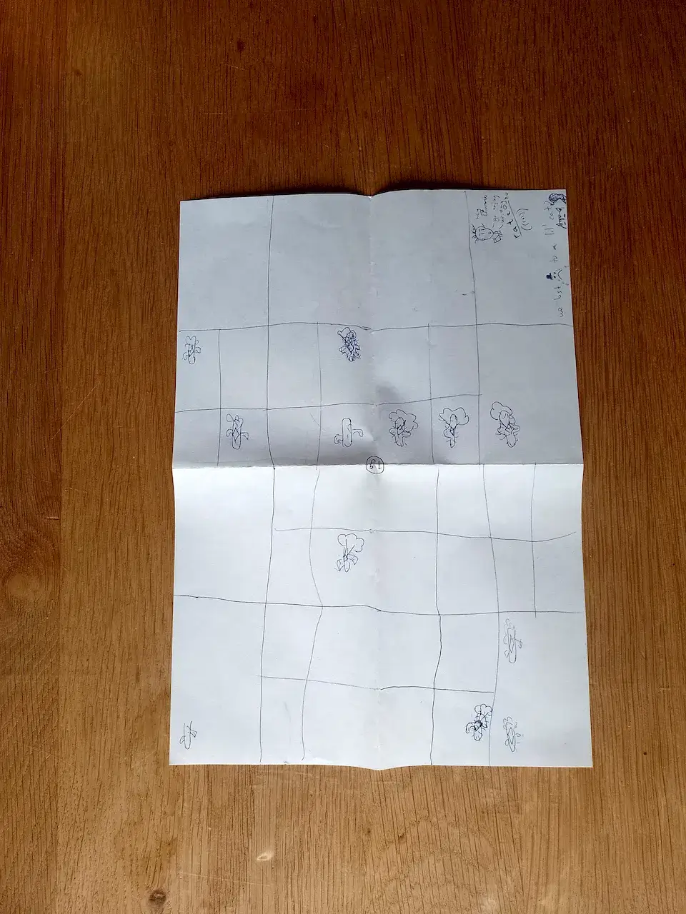 This is one test game. Over time, you explore more of the board ( = subdivide it), and write down clues (broken trees, footprints, etcetera) about where the cryptid was or what photographs said.